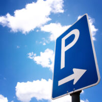 parking sign (4) with blue sky and clouds